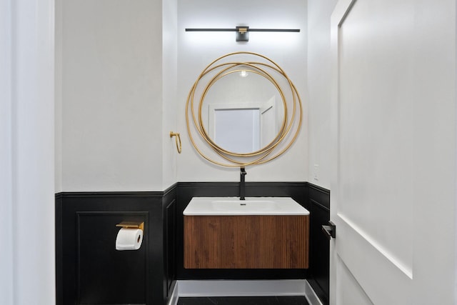 211 Whisper Ridge Dr, Bigfork, MT 59911 - half bathroom featuring vanity