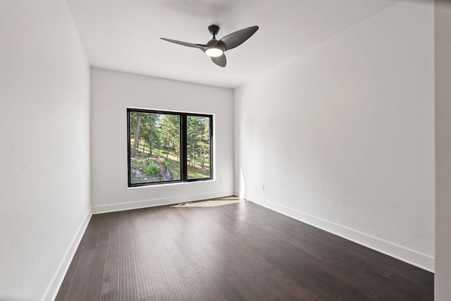 211 Whisper Ridge Dr, Bigfork, MT 59911 - spare room featuring dark wood finished floors and ceiling fan