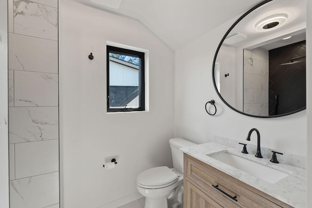 211 Whisper Ridge Dr, Bigfork, MT 59911 - full bath with lofted ceiling, vanity, and a shower