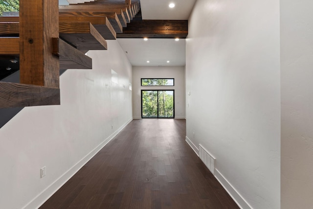 211 Whisper Ridge Dr, Bigfork, MT 59911 - hallway featuring beamed ceiling, wood finished floors, and recessed lighting