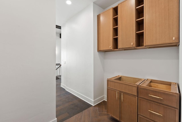 211 Whisper Ridge Dr, Bigfork, MT 59911 - hallway with an upstairs landing, recessed lighting, and dark wood-type flooring