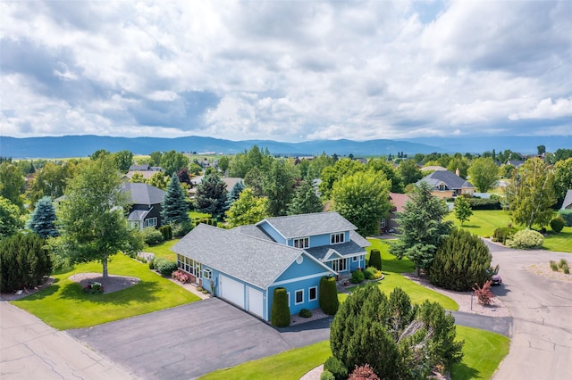 286 Arbour Dr W, Kalispell, MT 59901 - aerial perspective of suburban area featuring mountains