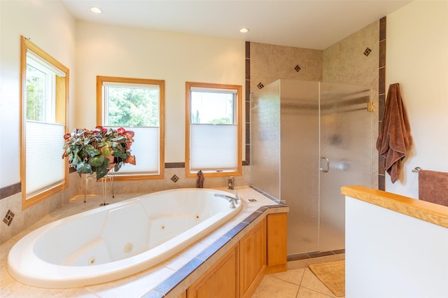286 Arbour Dr W, Kalispell, MT 59901 - full bathroom featuring a stall shower, a whirlpool tub, tile patterned flooring, and recessed lighting