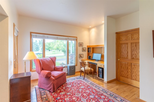 286 Arbour Dr W, Kalispell, MT 59901 - living area with light wood-style flooring and built in desk