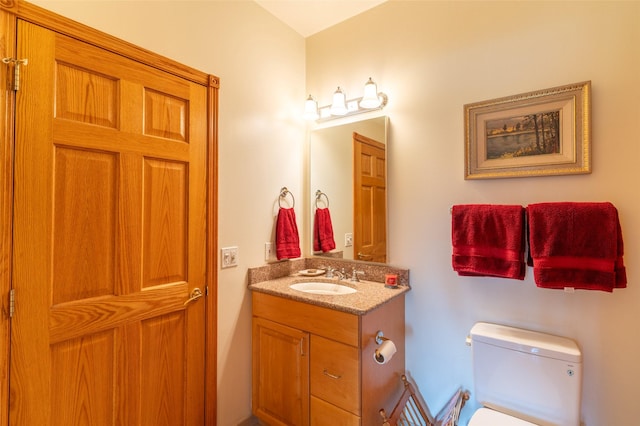 286 Arbour Dr W, Kalispell, MT 59901 - half bath featuring vanity and toilet