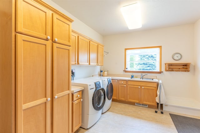 286 Arbour Dr W, Kalispell, MT 59901 - laundry area featuring cabinet space and washing machine and dryer