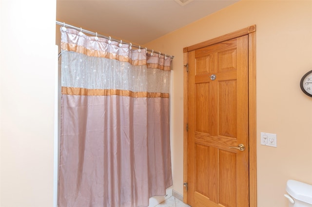 286 Arbour Dr W, Kalispell, MT 59901 - bathroom with toilet and a shower with shower curtain