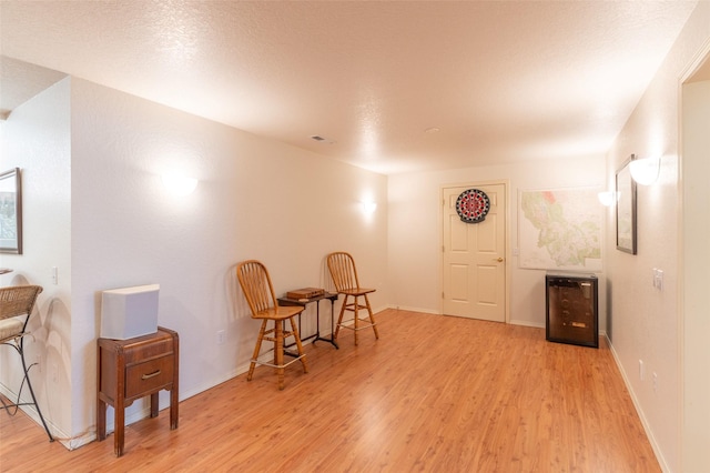 286 Arbour Dr W, Kalispell, MT 59901 - living area with wood finished floors and wine cooler
