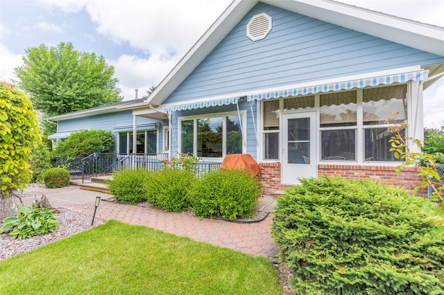 286 Arbour Dr W, Kalispell, MT 59901 - rear view of property with brick siding