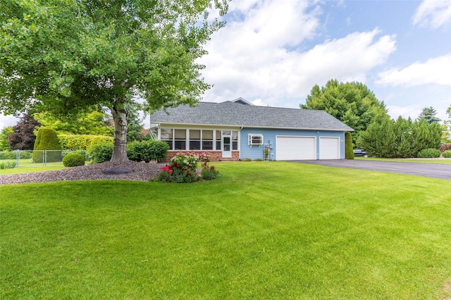 286 Arbour Dr W, Kalispell, MT 59901 - view of front of property with driveway, a garage, and a shingled roof