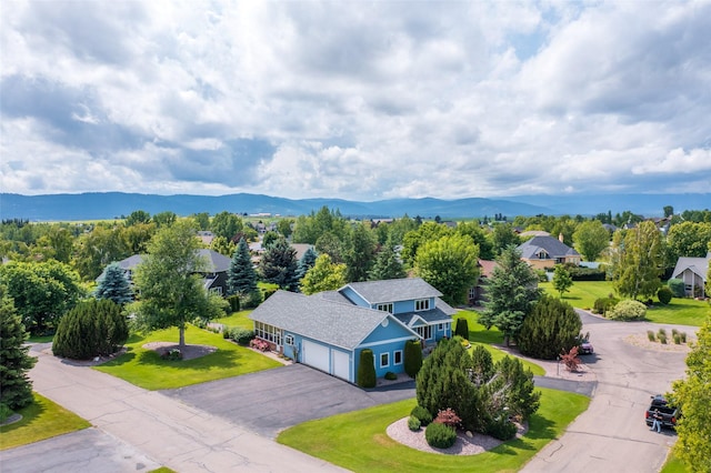 286 Arbour Dr W, Kalispell, MT 59901 - aerial perspective of suburban area with mountains