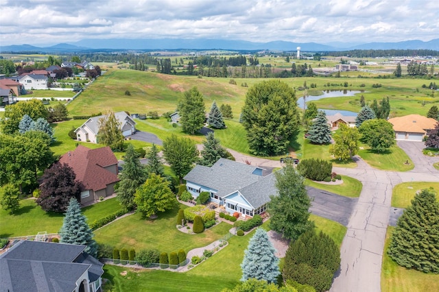 286 Arbour Dr W, Kalispell, MT 59901 - aerial perspective of suburban area with a water and mountain view