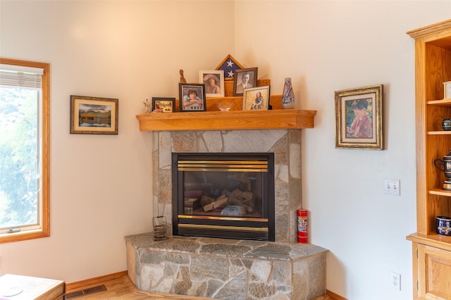 286 Arbour Dr W, Kalispell, MT 59901 - detailed view of baseboards and a fireplace