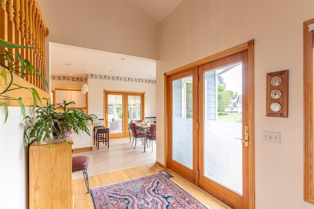 286 Arbour Dr W, Kalispell, MT 59901 - entrance foyer featuring light wood-style flooring, lofted ceiling, and french doors