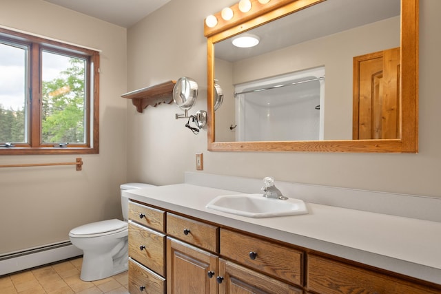 9995 Obrien Creek Rd, Missoula, MT 59804 - bathroom with baseboard heating, vanity, a shower, and tile patterned floors