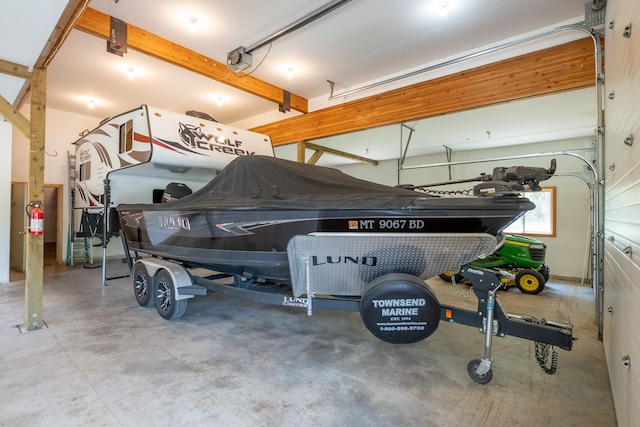 9995 Obrien Creek Rd, Missoula, MT 59804 - garage featuring a garage door opener