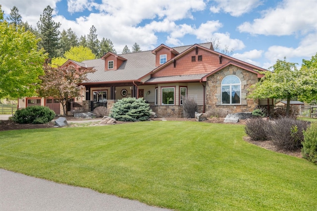 9995 Obrien Creek Rd, Missoula, MT 59804 - view of front facade with stone siding and a front lawn