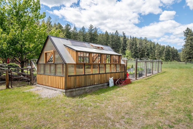 9995 Obrien Creek Rd, Missoula, MT 59804 - rear view of property featuring an exterior structure and an outdoor structure