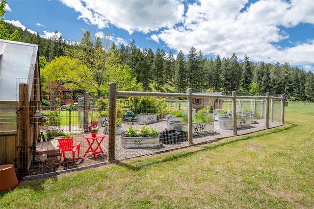9995 Obrien Creek Rd, Missoula, MT 59804 - view of green lawn with a garden