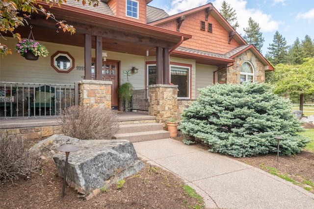 9995 Obrien Creek Rd, Missoula, MT 59804 - doorway to property featuring stone siding