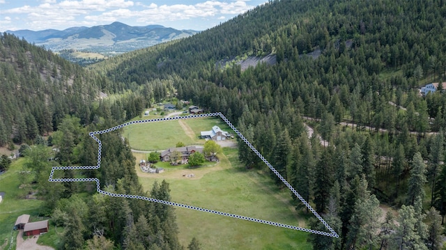 9995 Obrien Creek Rd, Missoula, MT 59804 - drone / aerial view of a forest and mountains