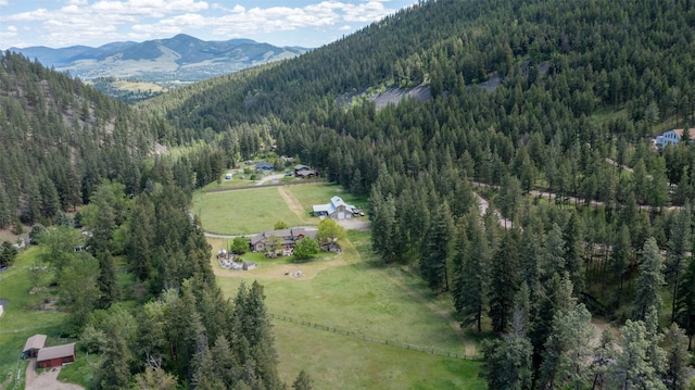 9995 Obrien Creek Rd, Missoula, MT 59804 - aerial overview of property's location featuring a heavily wooded area and a mountainous background