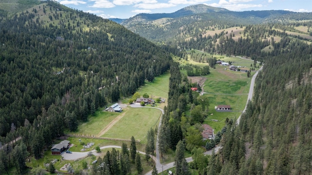 9995 Obrien Creek Rd, Missoula, MT 59804 - aerial view of property and surrounding area featuring a mountain backdrop and rural landscape