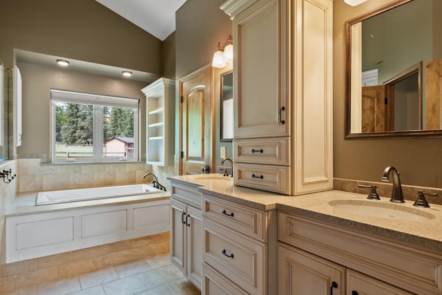 9995 Obrien Creek Rd, Missoula, MT 59804 - bathroom with double vanity, a bath, tile patterned flooring, and vaulted ceiling