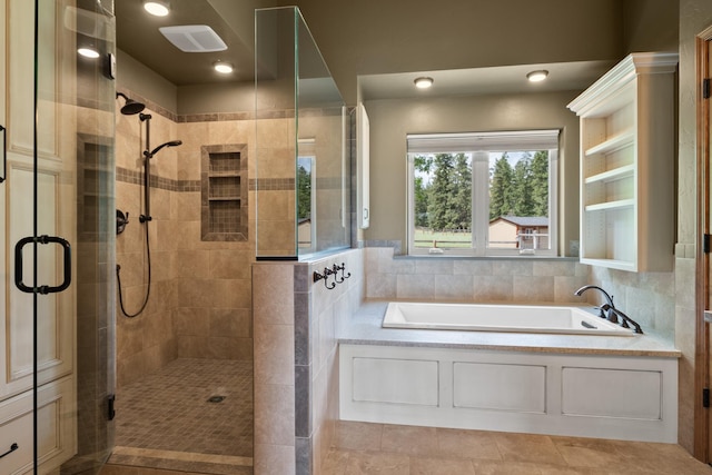 9995 Obrien Creek Rd, Missoula, MT 59804 - full bath featuring a stall shower, a garden tub, and tile patterned flooring