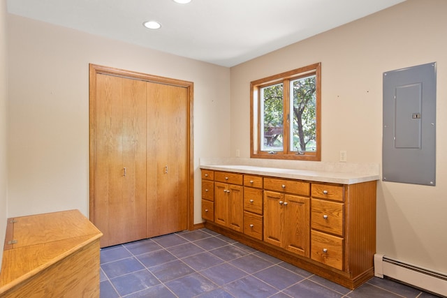 9995 Obrien Creek Rd, Missoula, MT 59804 - bathroom with a baseboard radiator, electric panel, tile patterned floors, and recessed lighting