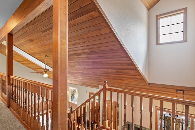 9995 Obrien Creek Rd, Missoula, MT 59804 - stairway with wooden ceiling, a ceiling fan, and high vaulted ceiling