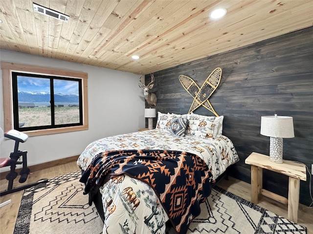 8 Montana Way, Ennis, MT 59729 - bedroom featuring recessed lighting, wood finished floors, wood ceiling, and wood walls