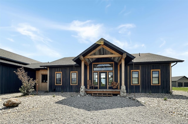 8 Montana Way, Ennis, MT 59729 - rear view of property featuring roof with shingles, board and batten siding, and a porch