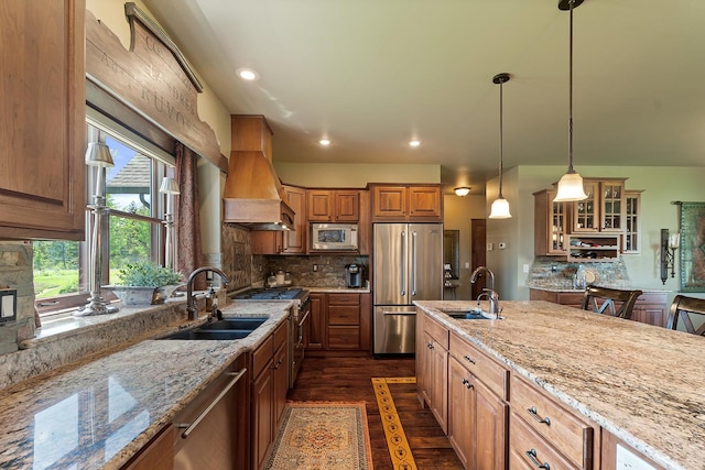 3 Antelope Ct, Clancy, MT 59634 - kitchen with premium appliances, light stone countertops, dark wood-style flooring, tasteful backsplash, and recessed lighting