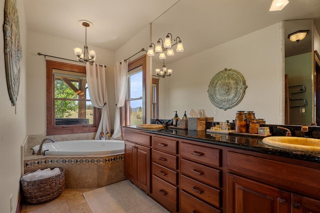 3 Antelope Ct, Clancy, MT 59634 - full bathroom with a chandelier, double vanity, and a garden tub