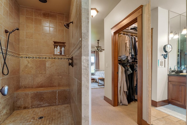 3 Antelope Ct, Clancy, MT 59634 - full bathroom with vanity, tiled shower, a spacious closet, and ceiling fan