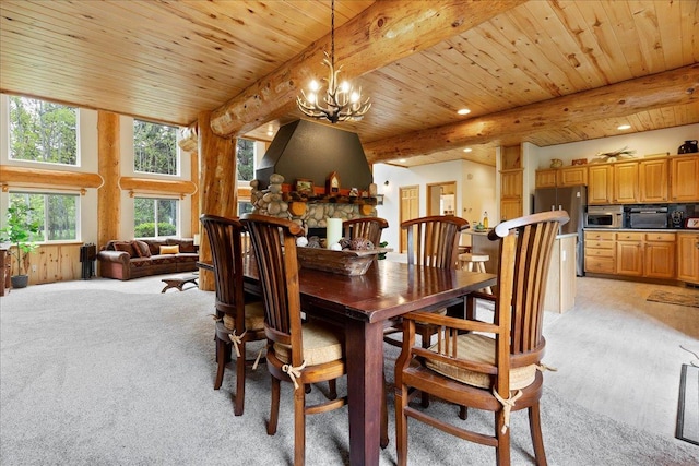 150 Drake Dr, Kalispell, MT 59901 - dining room with a chandelier, recessed lighting, light carpet, and a wood ceiling with exposed beams