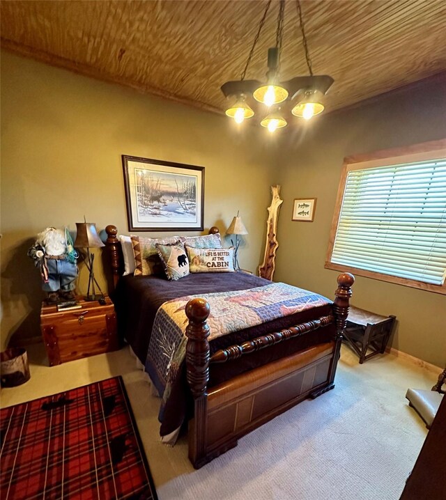 172 Hayfield Loop Trl, Ennis, MT 59729 - bedroom with wood ceiling and carpet