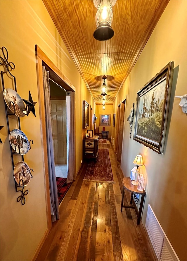172 Hayfield Loop Trl, Ennis, MT 59729 - hallway with crown molding, wood-type flooring, and wood ceiling