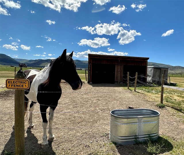 172 Hayfield Loop Trl, Ennis, MT 59729 - view of outbuilding with a mountain view