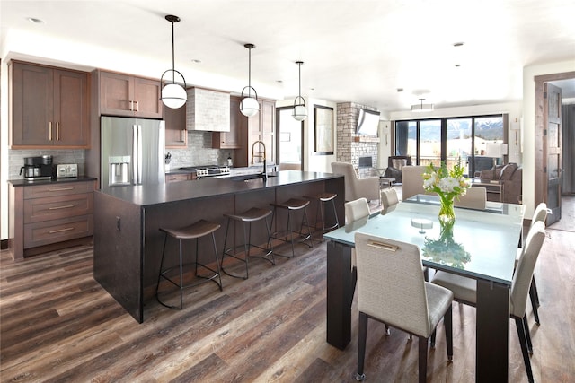 311E Akers Ln Unit E, Whitefish, MT 59937 - dining space with dark wood-style flooring and recessed lighting
