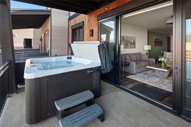 311E Akers Ln Unit E, Whitefish, MT 59937 - view of patio / terrace with a hot tub