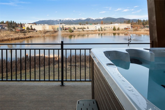 311E Akers Ln Unit E, Whitefish, MT 59937 - balcony with a water and mountain view