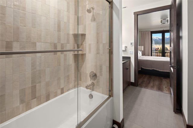 311E Akers Ln Unit E, Whitefish, MT 59937 - full bathroom with connected bathroom, tile patterned flooring, and combined bath / shower with glass door