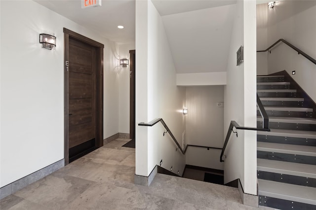 311E Akers Ln Unit E, Whitefish, MT 59937 - stairway featuring baseboards