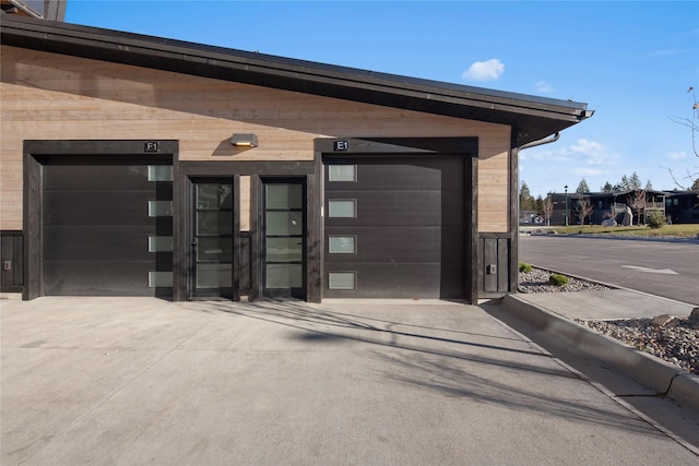 311E Akers Ln Unit E, Whitefish, MT 59937 - garage featuring driveway