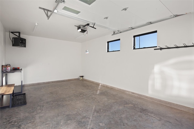 311E Akers Ln Unit E, Whitefish, MT 59937 - garage with a garage door opener and a heating unit