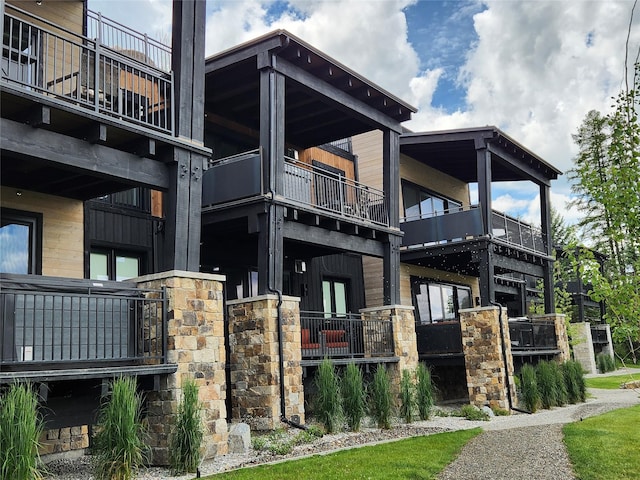 311E Akers Ln Unit E, Whitefish, MT 59937 - view of side of property with a balcony
