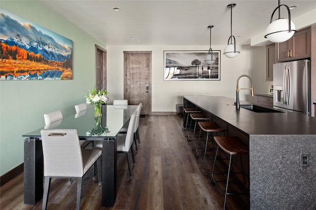 311E Akers Ln Unit E, Whitefish, MT 59937 - dining room featuring dark wood-style flooring and recessed lighting