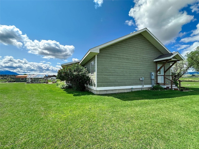 2 Hardy Cir, Ennis, MT 59729 - view of home's exterior featuring a yard